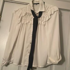 White blouse for casual or formal wear. Bought this for my daughter school pic
